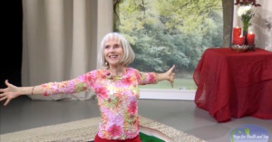 Patricia becker on a yoga mat ready to teach a yoga class