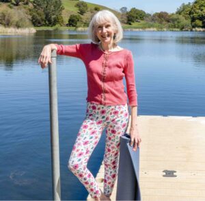 Patricia Becker with Yoga Mat on dock at lake