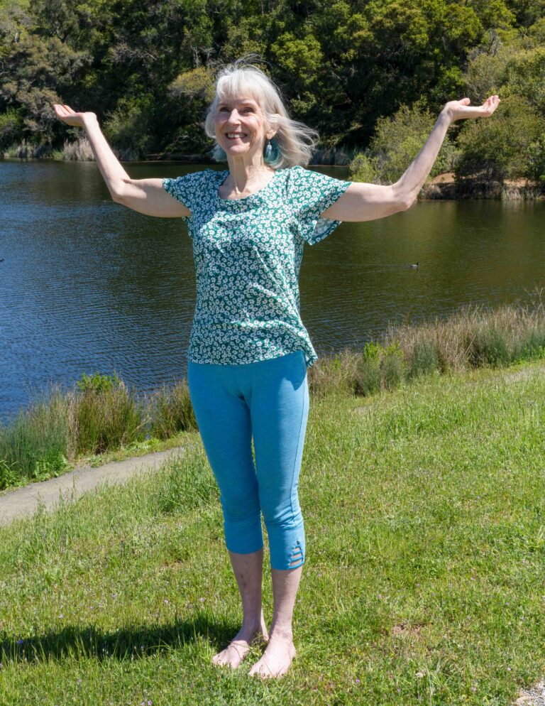 Patricia Becker arms up at lake