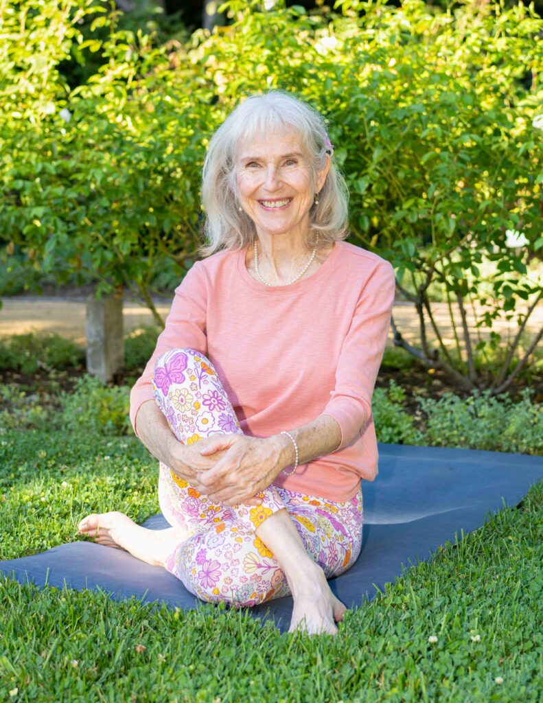 Patricia Becker Gentle Yoga for seniors Teacher seated pose hands on shins
