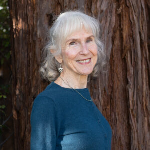 Patricia Becker Yoga Teacher for adults 50+ portrait by redwood tree