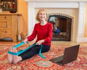 Patricia Becker legs forward in front of laptop